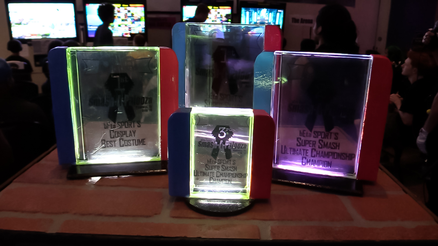 Smash-a-palooza tournament and cosplay trophies on display during the Super Smash Bros. Ultimate tournament. (Cypress News Review photo by Creighton Holub)