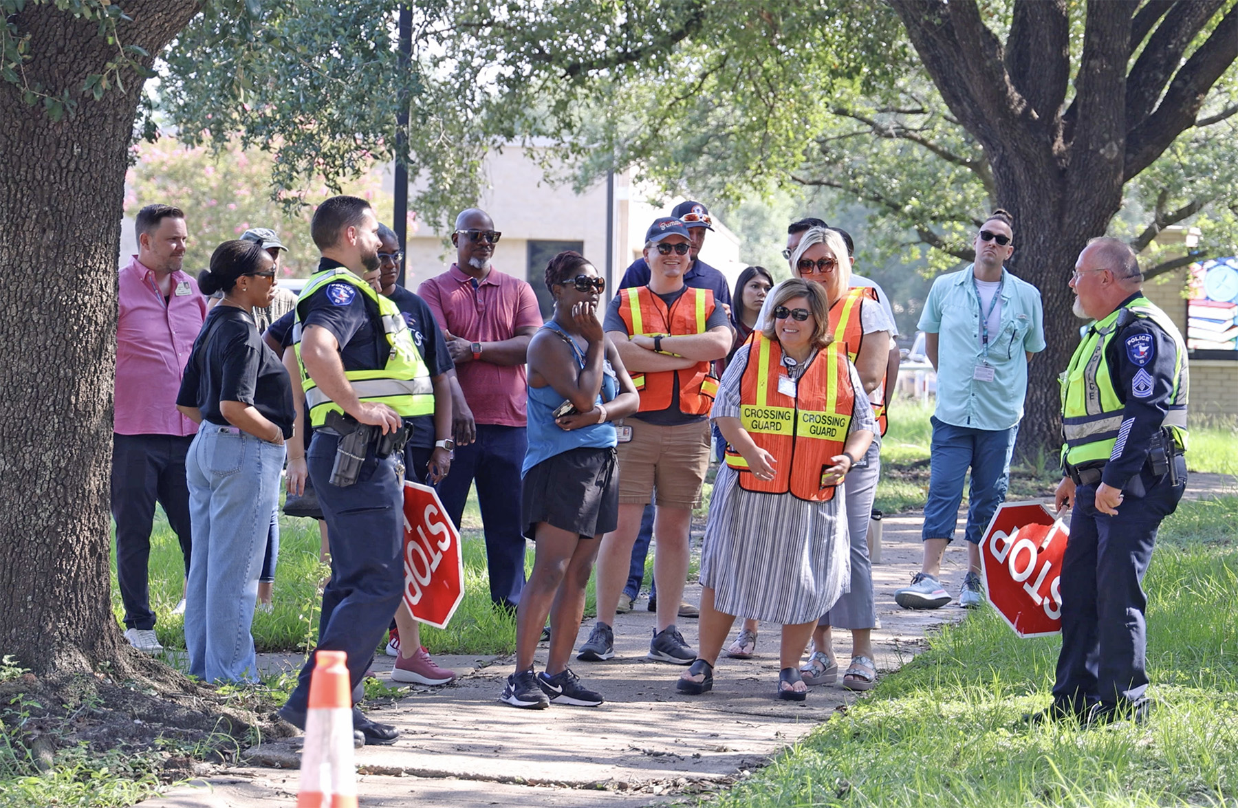 CFISD police officers hold a crossing guard training for CFISD staff members in the summer. Officers will provide additional trainings for interested community volunteers this fall. (Photo courtesy CFISD)